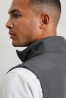 PR814 - MEN’S WINDCHECKER® PRINTABLE & RECYCLED SOFTSHELL GILET Kép 2.